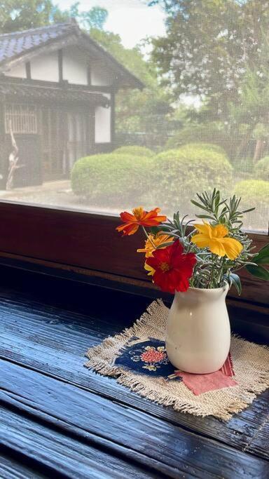 佐渡島に残る築130年の伝統的な古民家｜東夢 Villa Sado Buitenkant foto