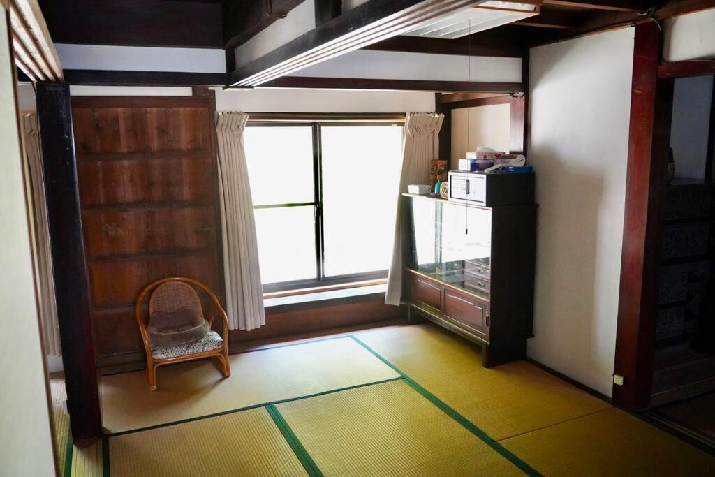 佐渡島に残る築130年の伝統的な古民家｜東夢 Villa Sado Buitenkant foto